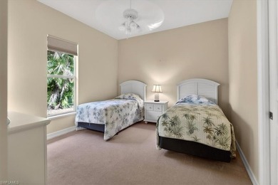 Lakefront and beautifully crafted, this custom-built home sits on Imperial Golf Club in Florida - for sale on GolfHomes.com, golf home, golf lot