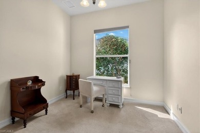 Lakefront and beautifully crafted, this custom-built home sits on Imperial Golf Club in Florida - for sale on GolfHomes.com, golf home, golf lot