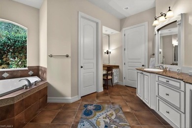 Lakefront and beautifully crafted, this custom-built home sits on Imperial Golf Club in Florida - for sale on GolfHomes.com, golf home, golf lot