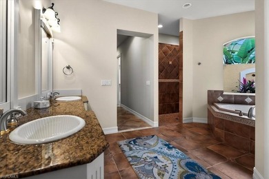 Lakefront and beautifully crafted, this custom-built home sits on Imperial Golf Club in Florida - for sale on GolfHomes.com, golf home, golf lot