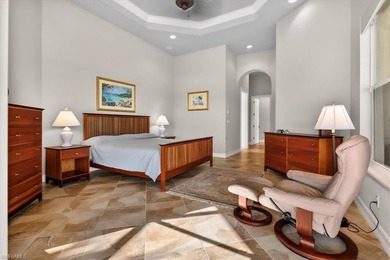 Lakefront and beautifully crafted, this custom-built home sits on Imperial Golf Club in Florida - for sale on GolfHomes.com, golf home, golf lot