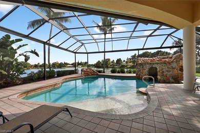 Lakefront and beautifully crafted, this custom-built home sits on Imperial Golf Club in Florida - for sale on GolfHomes.com, golf home, golf lot