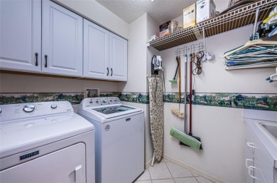 Welcome to your perfect retreat at 9636 Brookdale Dr., located on Timber Greens Country Club in Florida - for sale on GolfHomes.com, golf home, golf lot