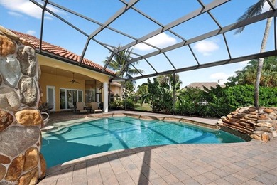 Lakefront and beautifully crafted, this custom-built home sits on Imperial Golf Club in Florida - for sale on GolfHomes.com, golf home, golf lot
