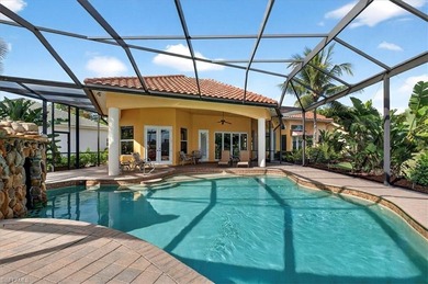 Lakefront and beautifully crafted, this custom-built home sits on Imperial Golf Club in Florida - for sale on GolfHomes.com, golf home, golf lot