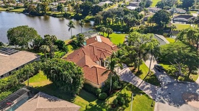 Lakefront and beautifully crafted, this custom-built home sits on Imperial Golf Club in Florida - for sale on GolfHomes.com, golf home, golf lot