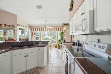 Enjoy relaxed Florida living with golf course views in this on Heritage Pines Country Club in Florida - for sale on GolfHomes.com, golf home, golf lot