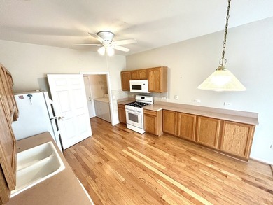 Buyers will love this *Scottsdale Model* Townhome with a Sunroom on Carillon Lakes 3 Hole Course in Illinois - for sale on GolfHomes.com, golf home, golf lot