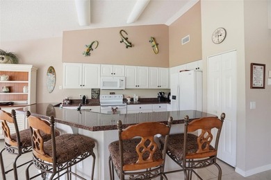 Enjoy relaxed Florida living with golf course views in this on Heritage Pines Country Club in Florida - for sale on GolfHomes.com, golf home, golf lot