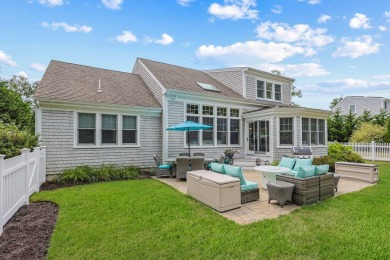 A tasteful and elegant home with inviting front porch is tucked on The Captains Golf Courses  in Massachusetts - for sale on GolfHomes.com, golf home, golf lot