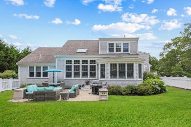 A tasteful and elegant home with inviting front porch is tucked on The Captains Golf Courses  in Massachusetts - for sale on GolfHomes.com, golf home, golf lot