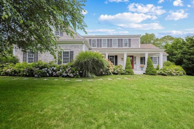 A tasteful and elegant home with inviting front porch is tucked on The Captains Golf Courses  in Massachusetts - for sale on GolfHomes.com, golf home, golf lot