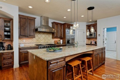Stunning home in private golf course community features a on Fox Hill Country Club in Colorado - for sale on GolfHomes.com, golf home, golf lot