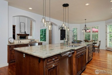 Stunning home in private golf course community features a on Fox Hill Country Club in Colorado - for sale on GolfHomes.com, golf home, golf lot
