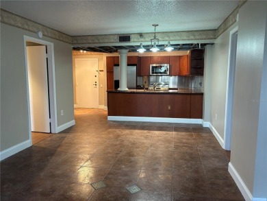 This spacious third-floor end unit offers true resort-type on Feather Sound Country Club in Florida - for sale on GolfHomes.com, golf home, golf lot
