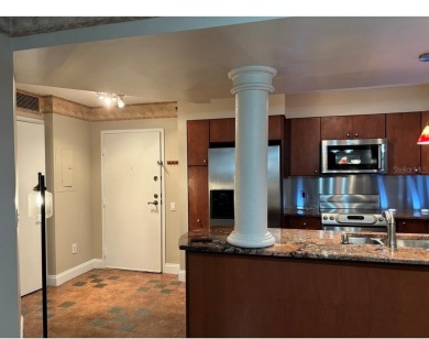 This spacious third-floor end unit offers true resort-type on Feather Sound Country Club in Florida - for sale on GolfHomes.com, golf home, golf lot