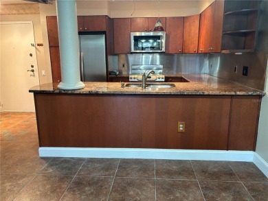 This spacious third-floor end unit offers true resort-type on Feather Sound Country Club in Florida - for sale on GolfHomes.com, golf home, golf lot