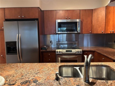 This spacious third-floor end unit offers true resort-type on Feather Sound Country Club in Florida - for sale on GolfHomes.com, golf home, golf lot