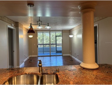 This spacious third-floor end unit offers true resort-type on Feather Sound Country Club in Florida - for sale on GolfHomes.com, golf home, golf lot