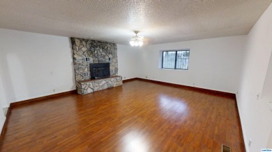 VIEWS and lots of room.  This lovely home has so much space with on Silver City Golf Course in New Mexico - for sale on GolfHomes.com, golf home, golf lot