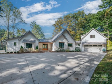 Modern farmhouse elegance meets refined mountain living in this on Country Club of Asheville in North Carolina - for sale on GolfHomes.com, golf home, golf lot