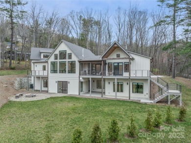 Modern farmhouse elegance meets refined mountain living in this on Country Club of Asheville in North Carolina - for sale on GolfHomes.com, golf home, golf lot