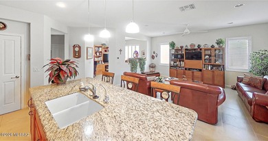 Live the Robson Resort lifestyle in this beautifully maintained on Quail Creek Country Club  in Arizona - for sale on GolfHomes.com, golf home, golf lot