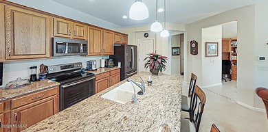 Live the Robson Resort lifestyle in this beautifully maintained on Quail Creek Country Club  in Arizona - for sale on GolfHomes.com, golf home, golf lot