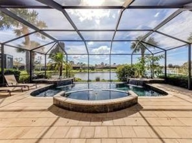 Breathtaking Lake & Sunset Views | Maintenance-Free Luxury on Venetian Golf and River Club in Florida - for sale on GolfHomes.com, golf home, golf lot