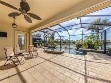 Breathtaking Lake & Sunset Views | Maintenance-Free Luxury on Venetian Golf and River Club in Florida - for sale on GolfHomes.com, golf home, golf lot