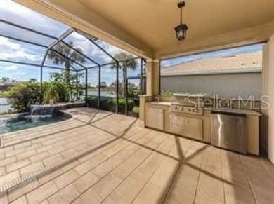 Breathtaking Lake & Sunset Views | Maintenance-Free Luxury on Venetian Golf and River Club in Florida - for sale on GolfHomes.com, golf home, golf lot