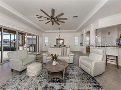 Breathtaking Lake & Sunset Views | Maintenance-Free Luxury on Venetian Golf and River Club in Florida - for sale on GolfHomes.com, golf home, golf lot