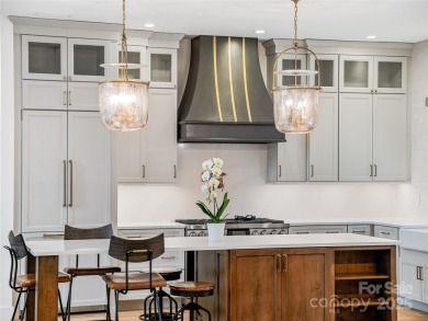 Modern farmhouse elegance meets refined mountain living in this on Country Club of Asheville in North Carolina - for sale on GolfHomes.com, golf home, golf lot