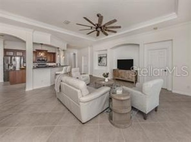 Breathtaking Lake & Sunset Views | Maintenance-Free Luxury on Venetian Golf and River Club in Florida - for sale on GolfHomes.com, golf home, golf lot