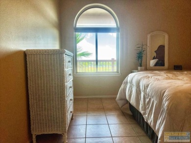 Enjoy panoramic views of the lake and golf course from this on South Padre Island Golf Club in Texas - for sale on GolfHomes.com, golf home, golf lot