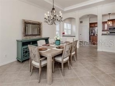 Breathtaking Lake & Sunset Views | Maintenance-Free Luxury on Venetian Golf and River Club in Florida - for sale on GolfHomes.com, golf home, golf lot