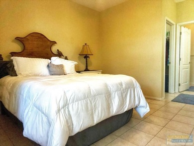 Enjoy panoramic views of the lake and golf course from this on South Padre Island Golf Club in Texas - for sale on GolfHomes.com, golf home, golf lot