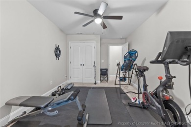 Welcome to this beautiful 4-bedroom, 3.5-bath home located in on Anderson Creek Golf Club in North Carolina - for sale on GolfHomes.com, golf home, golf lot