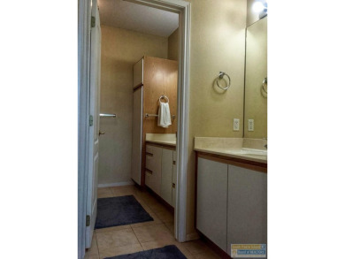 Enjoy panoramic views of the lake and golf course from this on South Padre Island Golf Club in Texas - for sale on GolfHomes.com, golf home, golf lot