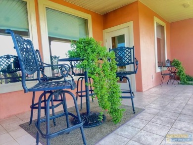 Enjoy panoramic views of the lake and golf course from this on South Padre Island Golf Club in Texas - for sale on GolfHomes.com, golf home, golf lot