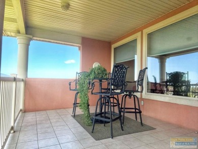 Enjoy panoramic views of the lake and golf course from this on South Padre Island Golf Club in Texas - for sale on GolfHomes.com, golf home, golf lot