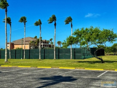 Enjoy panoramic views of the lake and golf course from this on South Padre Island Golf Club in Texas - for sale on GolfHomes.com, golf home, golf lot