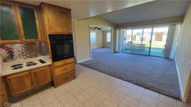 Perfectly situated & expanded 2 bedroom 1 bathroom is move-in on Leisure World Seal Beach Golf Course in California - for sale on GolfHomes.com, golf home, golf lot