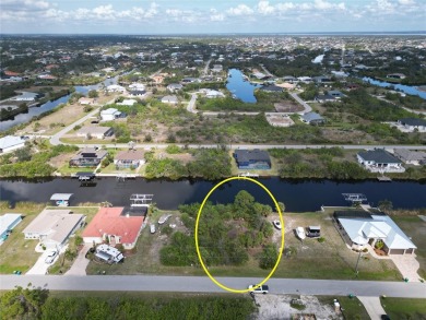 Waterfront Lot For Sale with 80 feet of shoreline overlooking on Rotonda Golf and Country Club - Long Marsh  in Florida - for sale on GolfHomes.com, golf home, golf lot