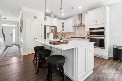 This beautifully designed 3-story home is ideal for entertaining on Fox Den Country Club in North Carolina - for sale on GolfHomes.com, golf home, golf lot