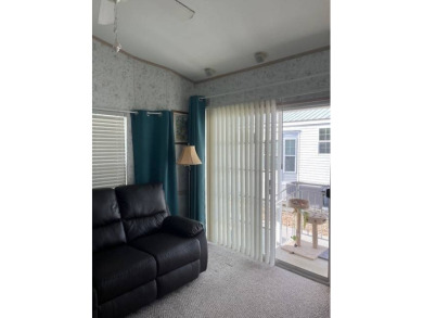 This well maintained 2011 Park Model is located in a 55+ on Deer Creek RV Golf Resort in Florida - for sale on GolfHomes.com, golf home, golf lot