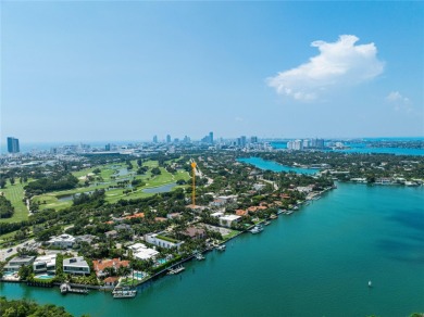 Grand 3-story gated home on prestigious lower North Bay Road on Miami Beach Golf Club in Florida - for sale on GolfHomes.com, golf home, golf lot