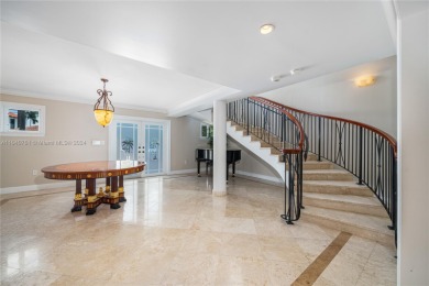 Grand 3-story gated home on prestigious lower North Bay Road on Miami Beach Golf Club in Florida - for sale on GolfHomes.com, golf home, golf lot