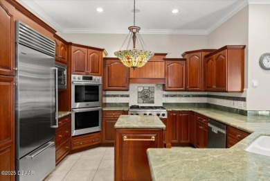 Welcome to this exquisite custom-built home located in the on Plantation Bay Golf and Country Club in Florida - for sale on GolfHomes.com, golf home, golf lot