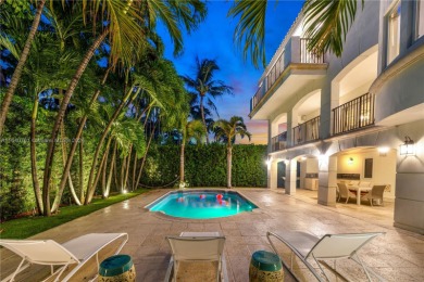 Grand 3-story gated home on prestigious lower North Bay Road on Miami Beach Golf Club in Florida - for sale on GolfHomes.com, golf home, golf lot